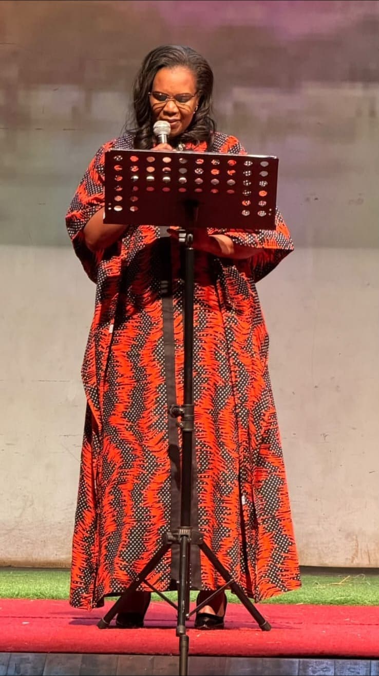 The director speaking at a school event